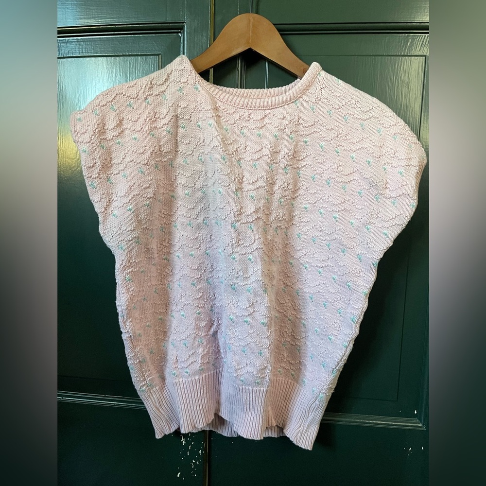 Pink sweater vest